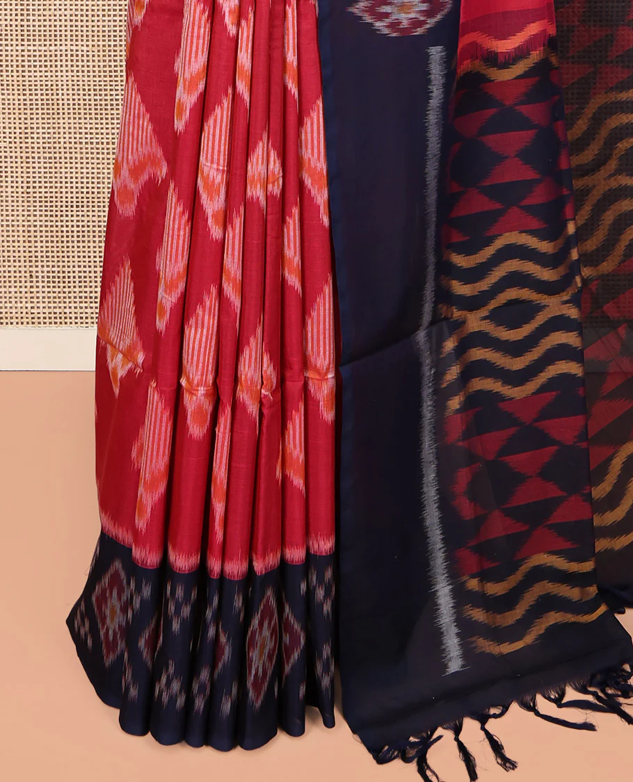 Red Ikkat Cotton Saree, Decorated with Ikkat-style Buttas All Over Its Body, Complemented by a Contrast Ikkat-Textured Border, Pallu of Geometric Patterns, and Paired with a Contrast Blouse - Image 3