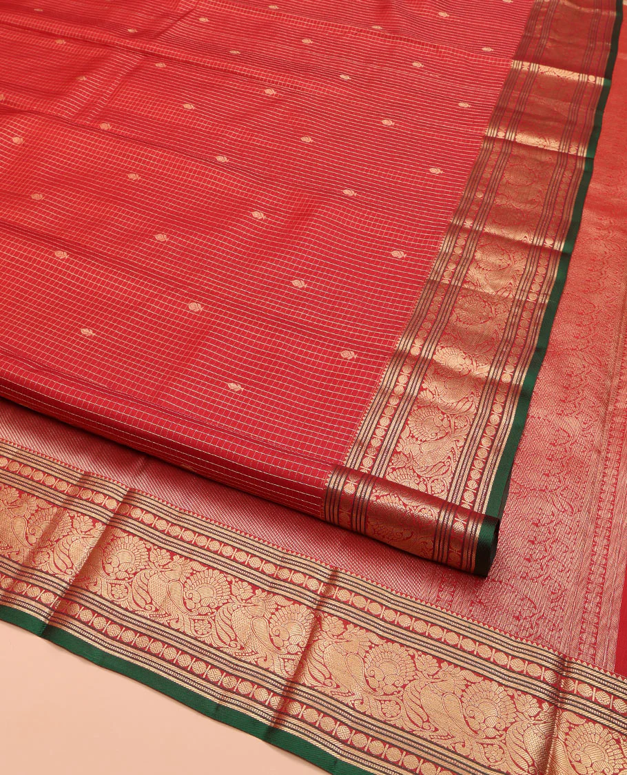 Red Kanchipuram Silk Saree, Richly Detailed with Zari Butta Enclosed Checks on Its Body, Highlighted by Zari Border of Rekku, Poun, Banaras, and Mayil Kann Designs, Diagonally Striped Pallu, and Paired with a Contrast Blouse - Image 2