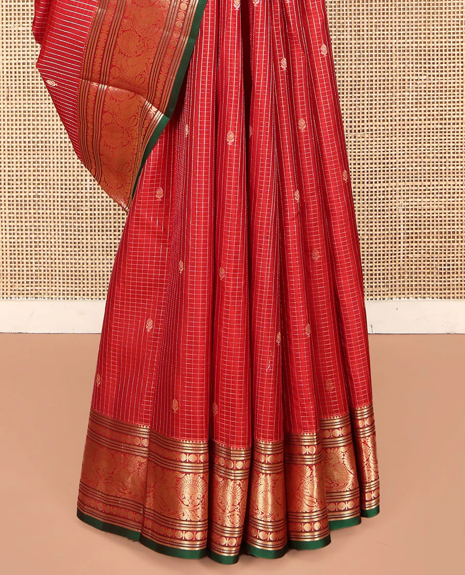 Red Kanchipuram Silk Saree, Richly Detailed with Zari Butta Enclosed Checks on Its Body, Highlighted by Zari Border of Rekku, Poun, Banaras, and Mayil Kann Designs, Diagonally Striped Pallu, and Paired with a Contrast Blouse - Image 4