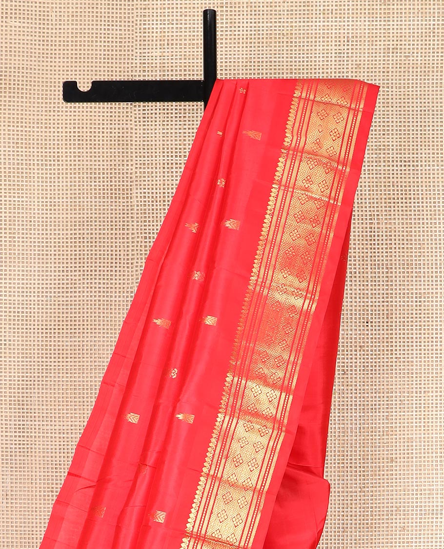 Red Kanchipuram Silk Saree Spotlighted with Zari Buttas All Over Its Body, Highlighted by Zari One-sided Border Featuring Thilakam Mokku, Banaras, Muthu, and Jaal Designs, Zari Design Pallu, and Comes Without a Blouse - Image 3