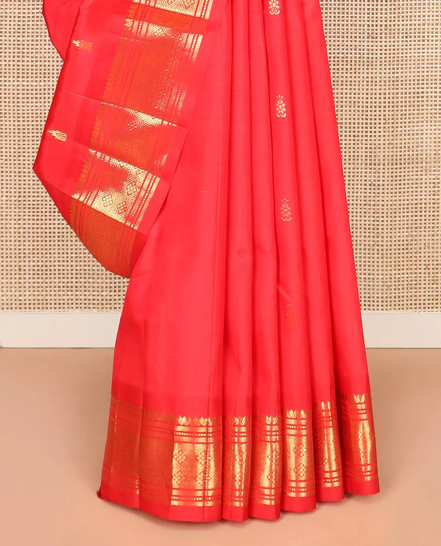 Red Kanchipuram Silk Saree Spotlighted with Zari Buttas All Over Its Body, Highlighted by Zari One-sided Border Featuring Thilakam Mokku, Banaras, Muthu, and Jaal Designs, Zari Design Pallu, and Comes Without a Blouse - Image 4