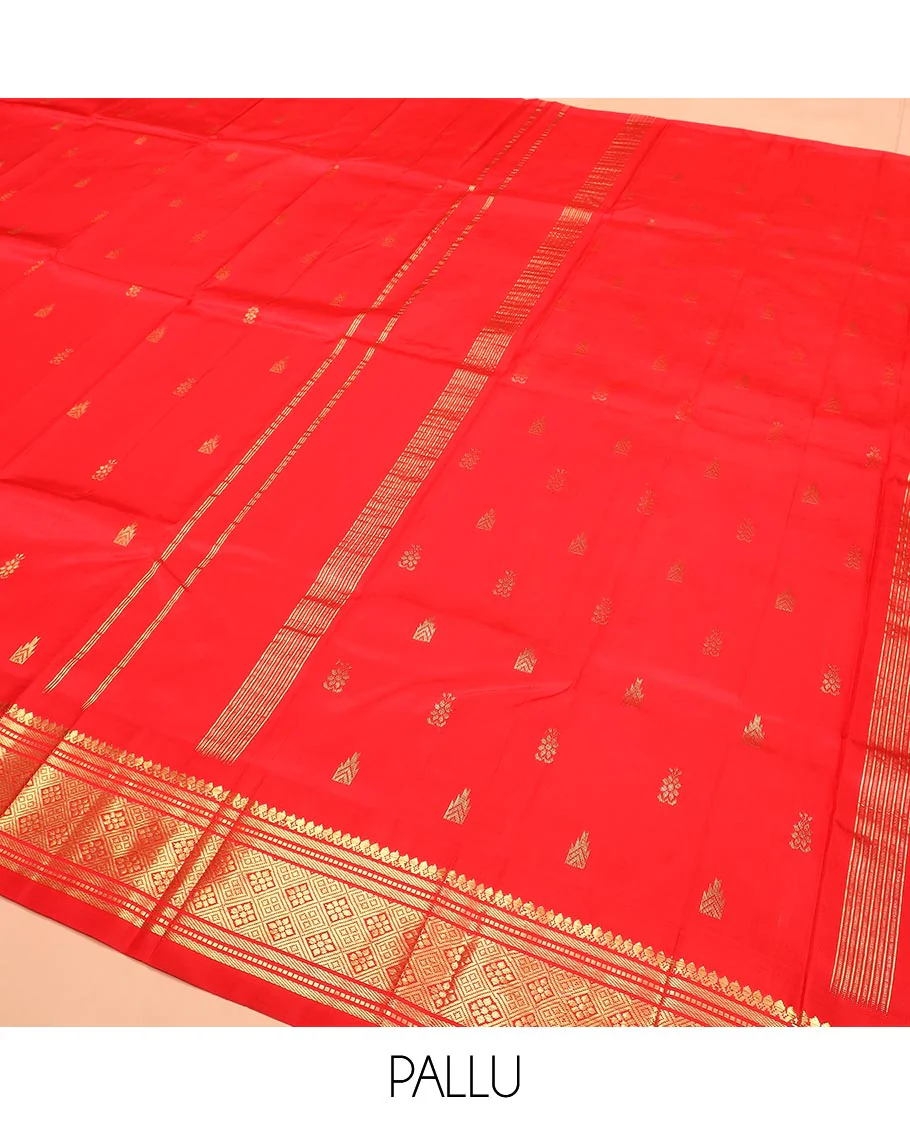 Red Kanchipuram Silk Saree Spotlighted with Zari Buttas All Over Its Body, Highlighted by Zari One-sided Border Featuring Thilakam Mokku, Banaras, Muthu, and Jaal Designs, Zari Design Pallu, and Comes Without a Blouse - Image 5
