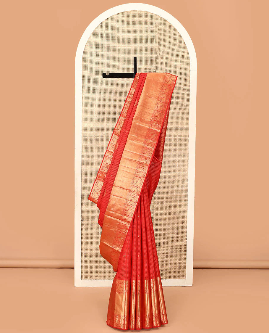 Red zari stripes and buttas Kanchipuram silk saree, zari border of thilakam, paisa, round mayil, and mayil kann designs, and jaal pallu