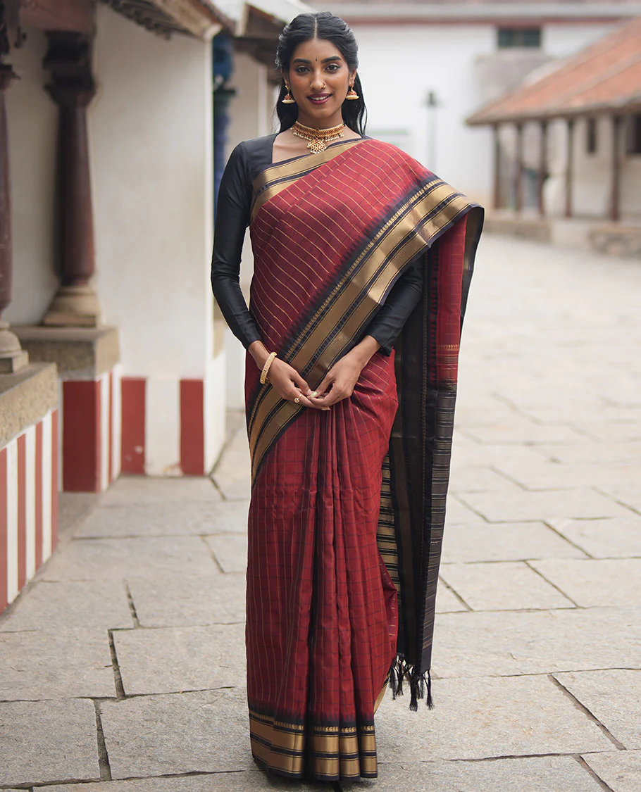 Rust Maroon and Dark Purple Vasundhara Lite Silk Mix Saree, Accentuated with Checked Design All Over Its Body, Complemented by a Contrast Thazampoo Rekku Border of Manga Mokku, Muthu, and Mayil Kann Designs, Grand Pallu, and Paired with a Contrast Blouse