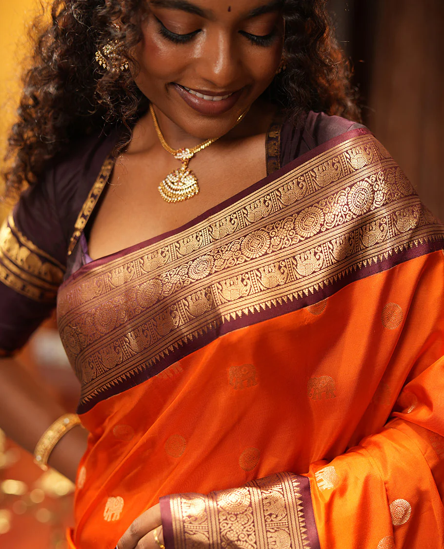 Rust Orange Vasundhara Silk Saree, Embellished with Mayil and Yaanai Buttas Across Its Body, Complemented by a Contrast Korvai Border of Rekku, Banaras, Yaanai, and Chakram Designs, Gleaming Jaal Pallu, and Paired with a Contrast Blouse - Image 3