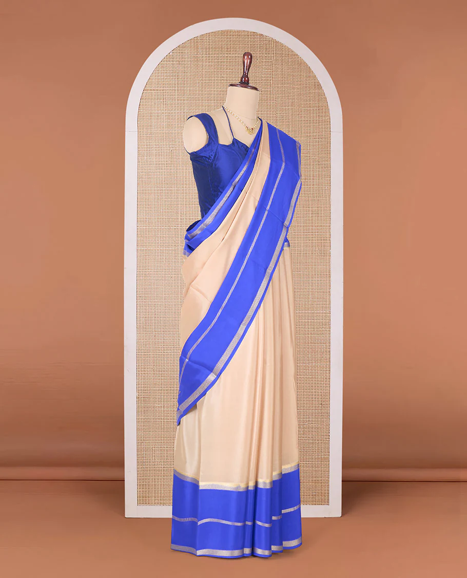 Sandal plain Mysore silk saree, contrast rettai pettu traditional zari border, and pallu of zari sparsely woven stripes