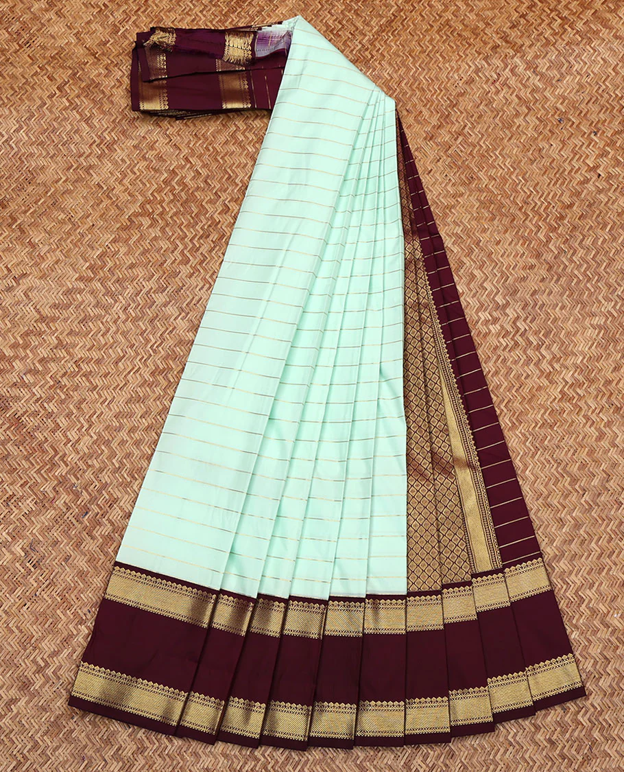 Turquoise Budget Silk Saree, Dazzled with Zari Stripes on Its Body, Complemented by a Contrast Traditional Zari Designs Woven Rettai Pettu Border, Grand Jaal Pallu, and Paired with a Contrast Blouse - Image 2