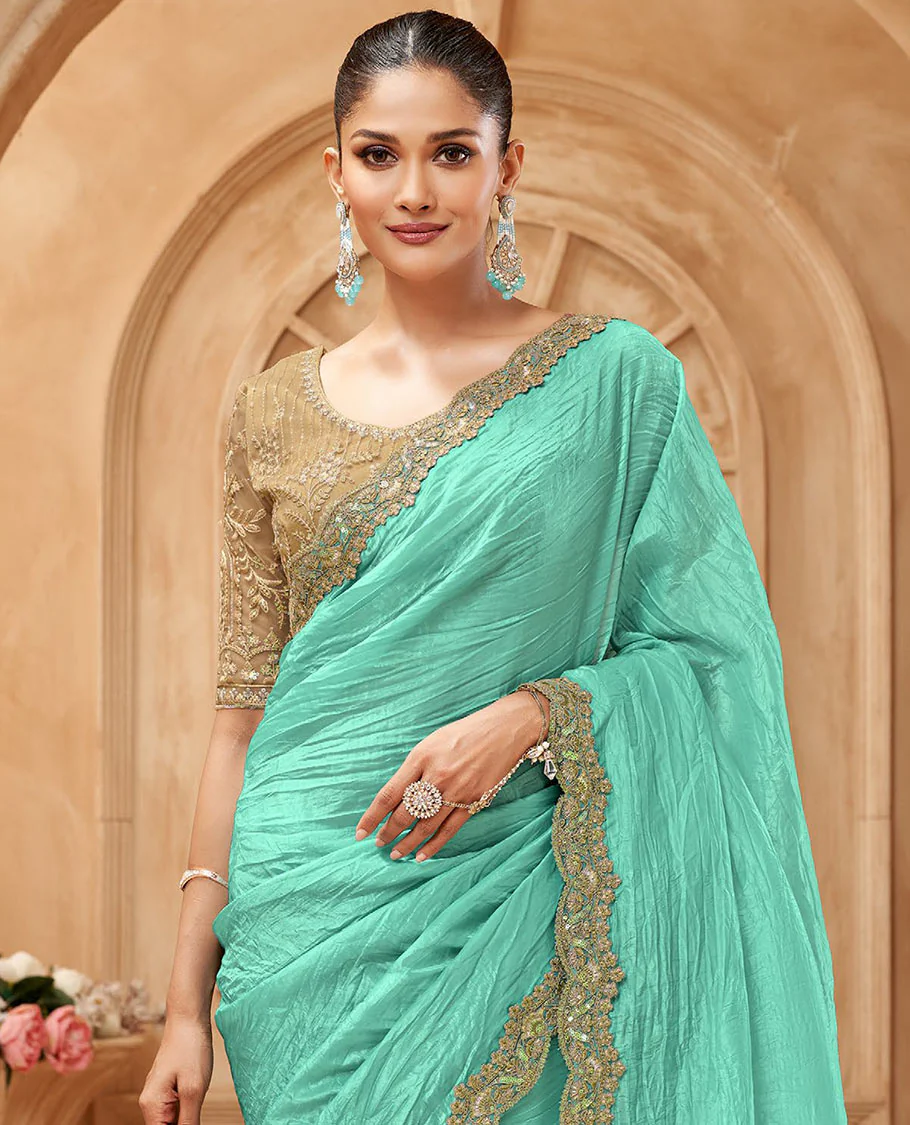 Turquoise crushed designer saree, scallop embroidered border, and contrast embroidered blouse - Image 2