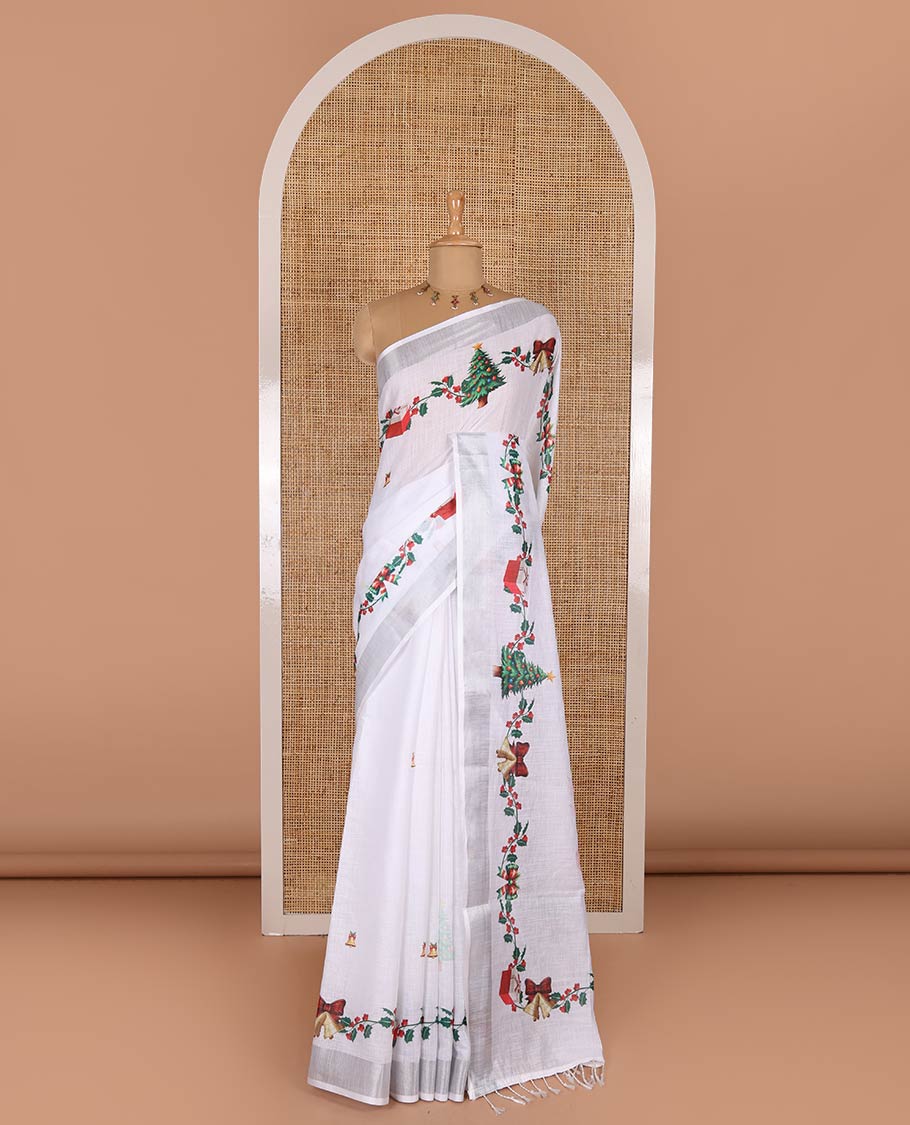 White jingle bell and Christmas tree motifs printed linen saree with bavanji borders, Santa Claus figure printed pallu, and a contrast jingle bell printed blouse - Image 3