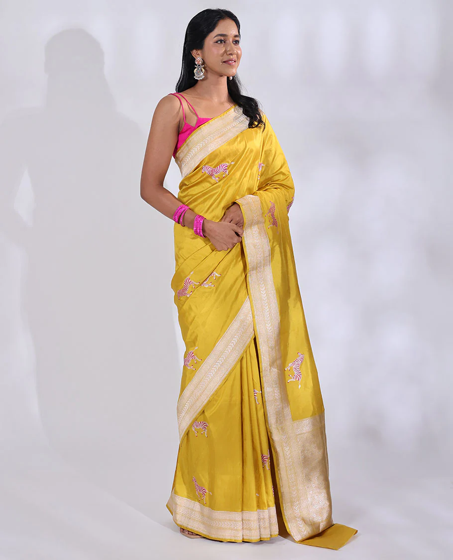 Yellow Banarasi Silk Saree Elevated with Zebra Motifs All Over Its Body, a Subtle Border of Traditional Designs, Pallu Decked Up with Floral and Diamond Designs, and Paired with a Matching Blouse - Image 3
