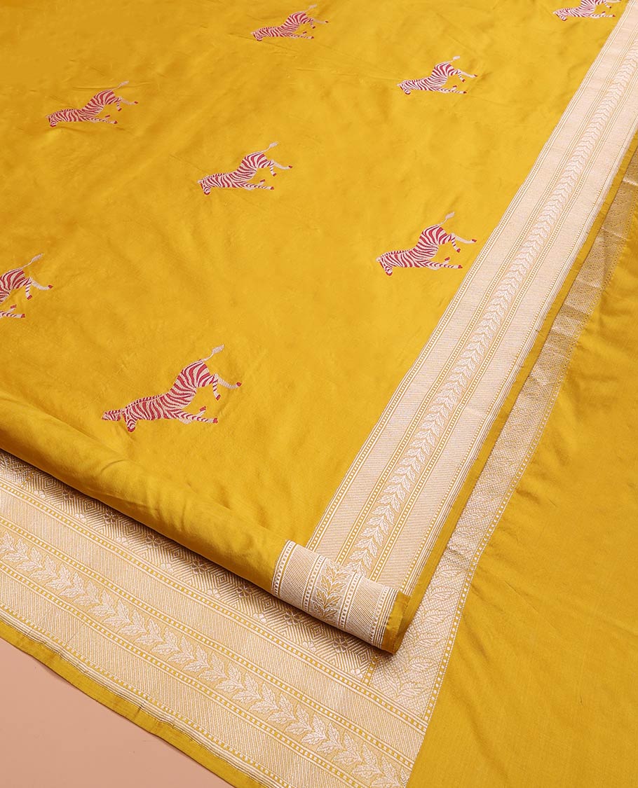 Yellow Banarasi Silk Saree Elevated with Zebra Motifs All Over Its Body, a Subtle Border of Traditional Designs, Pallu Decked Up with Floral and Diamond Designs, and Paired with a Matching Blouse - Image 6