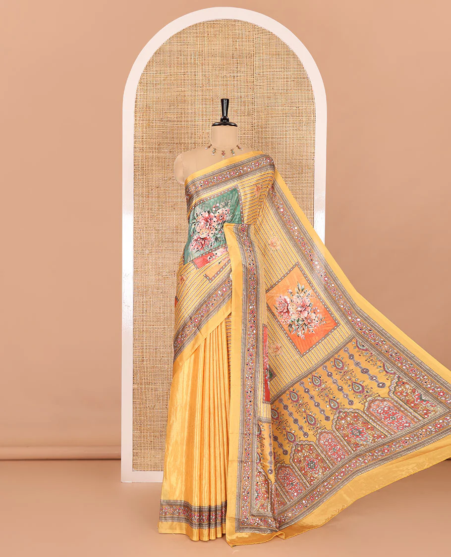 Yellow floral-printed and mirror-work masakali saree, printed with mirror-work border, an intricately decked-up Mughal-style pallu, and a matching blouse
