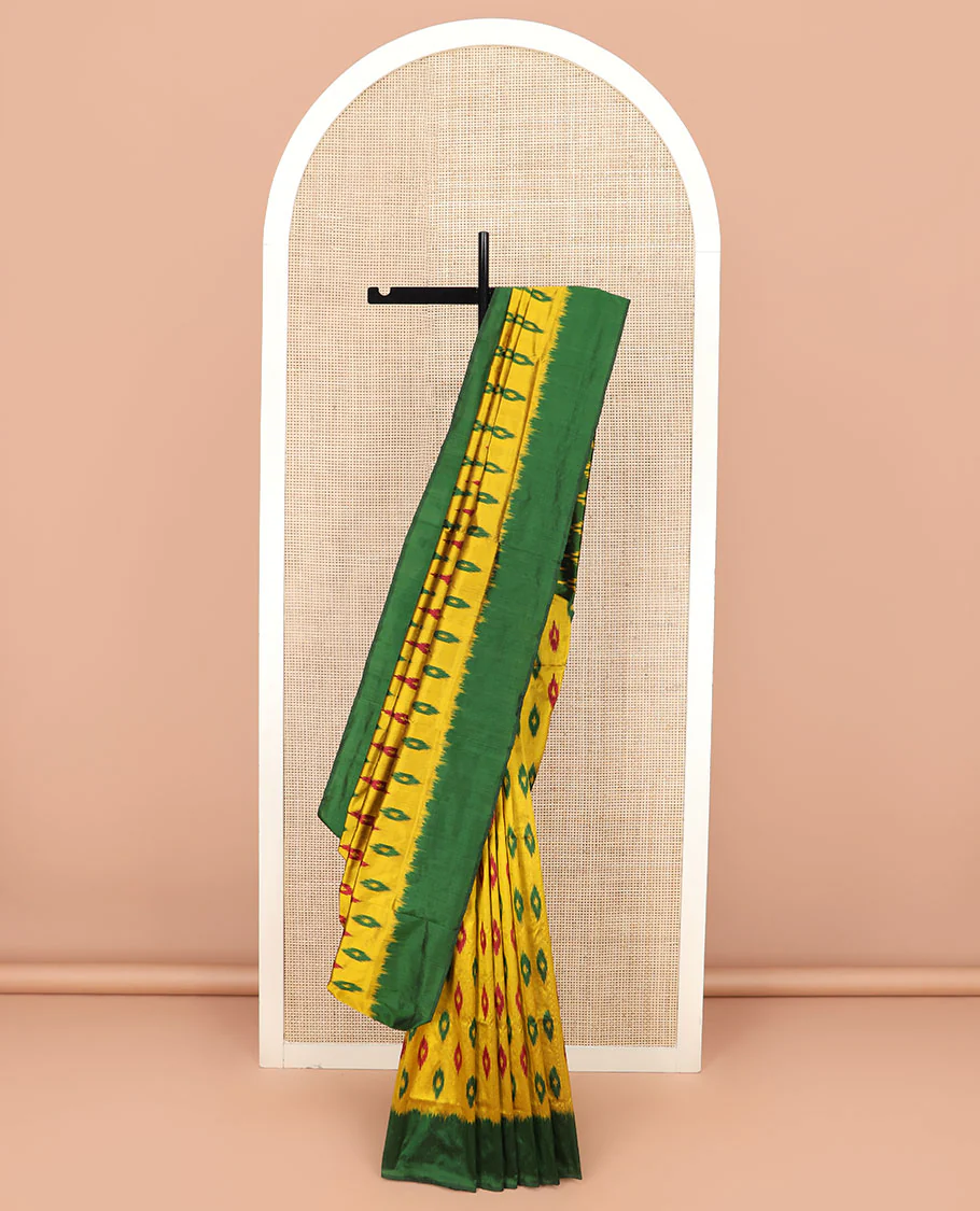 Yellow Ikkat Silk Saree Ornamented with Ikkat Buttas, Featuring a Contrast Plain Border, Complemented by a Pallu Ikkat Woven in an Ogee Pattern - Image 2