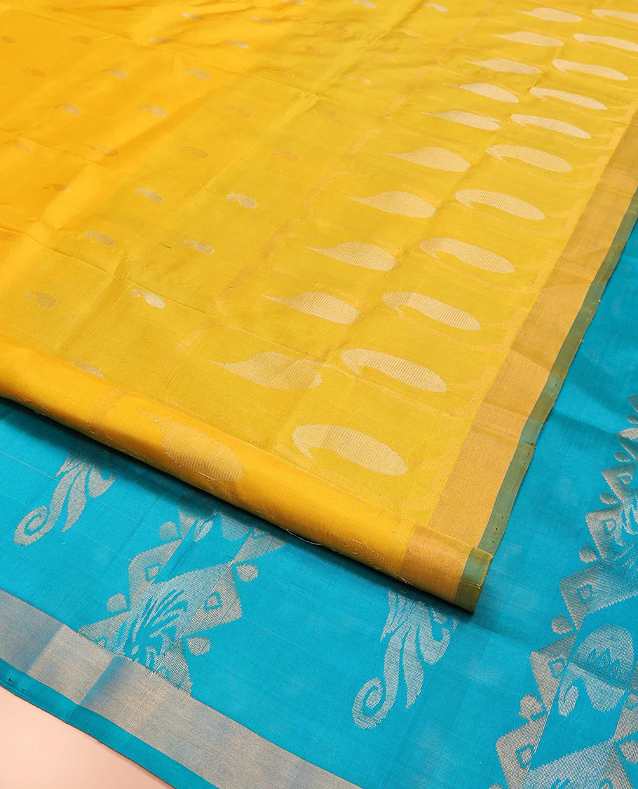 Yellow Uppada Silk Saree Gracefully Embellished with Zari Buttas and Paisley Buttas, Subtle Bavanji Border, Complemented by Contrast Pallu of Peacock Designs, and Paired with a Contrast Blouse - Image 2